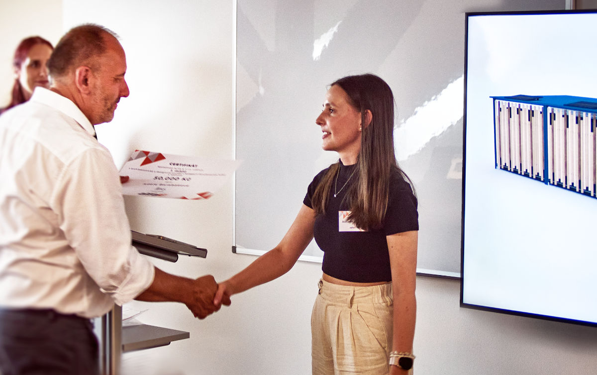 Ceremonial moment of the award presentation