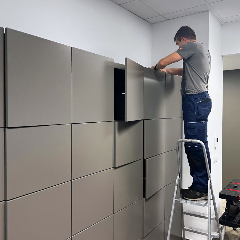 Installation of the locker units with electronically lockable storage boxes, connecting control electronics