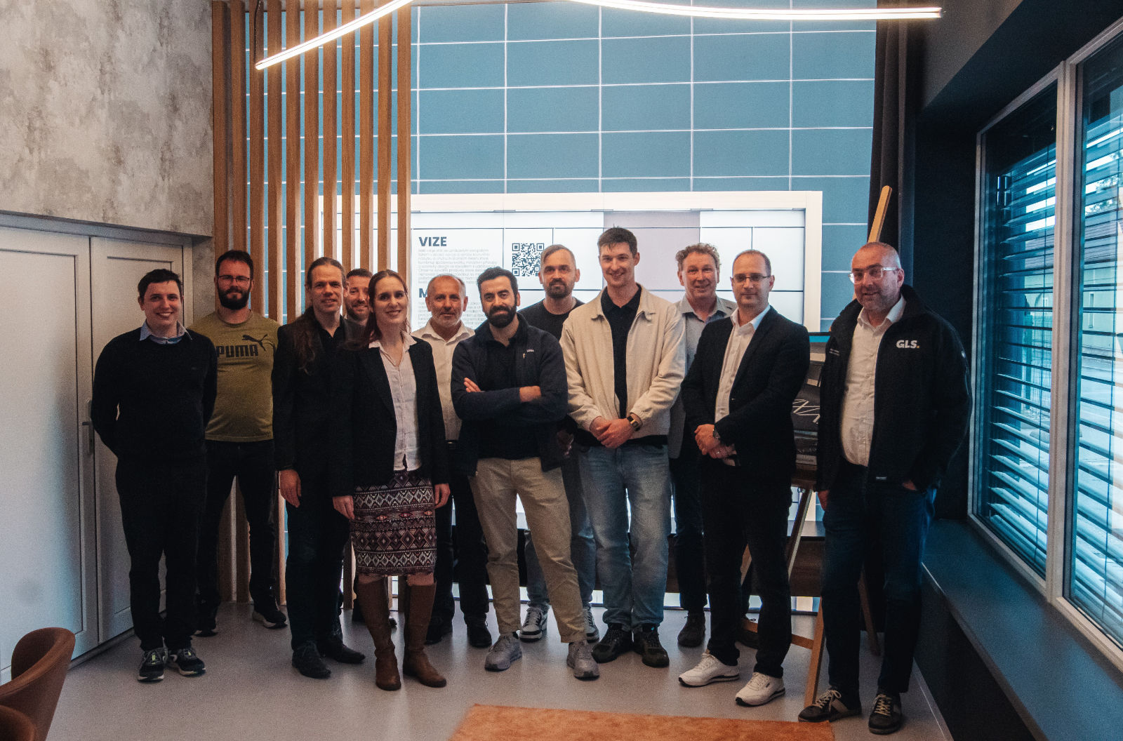 Group photo of the GLS Group, ALFA 3, and EGM teams during the visit to the ALFA 3 manufacturing plant in Luže, Czech Republic 