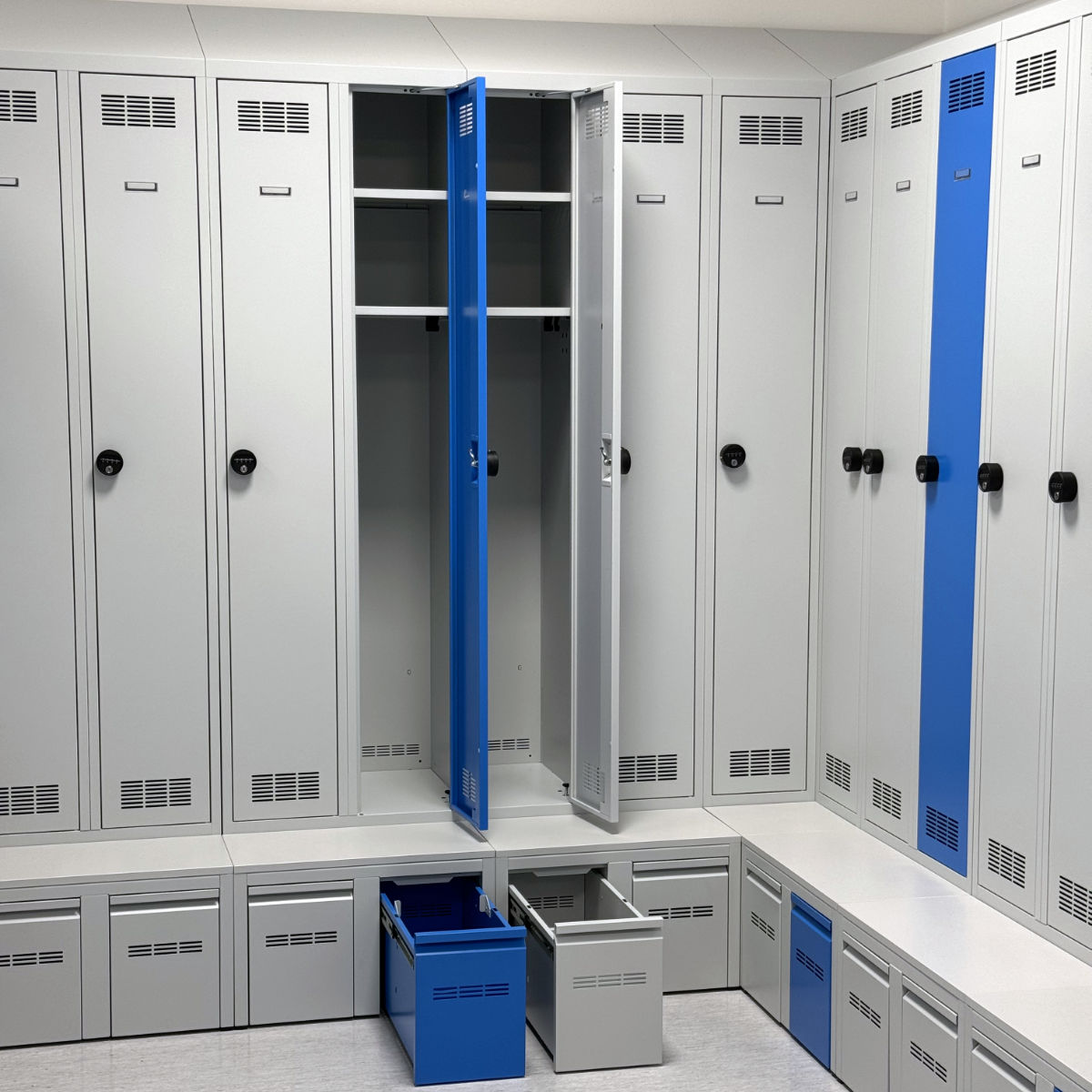 Open metal wardrobe for Panasonic employees with large storage space and pull-out shoe racks.
