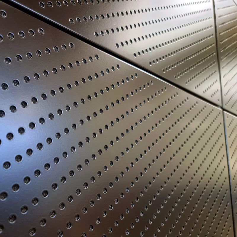 Perforated acoustic front door panels of the locker for shared workspaces