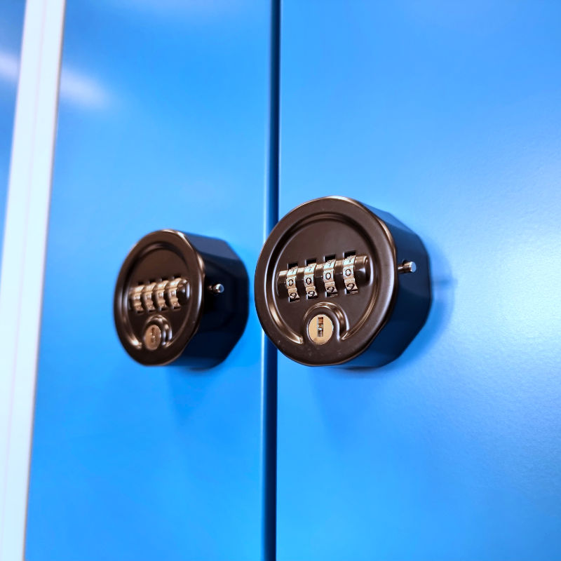 View of garment lockers placed on benches with pull-out shoe racks