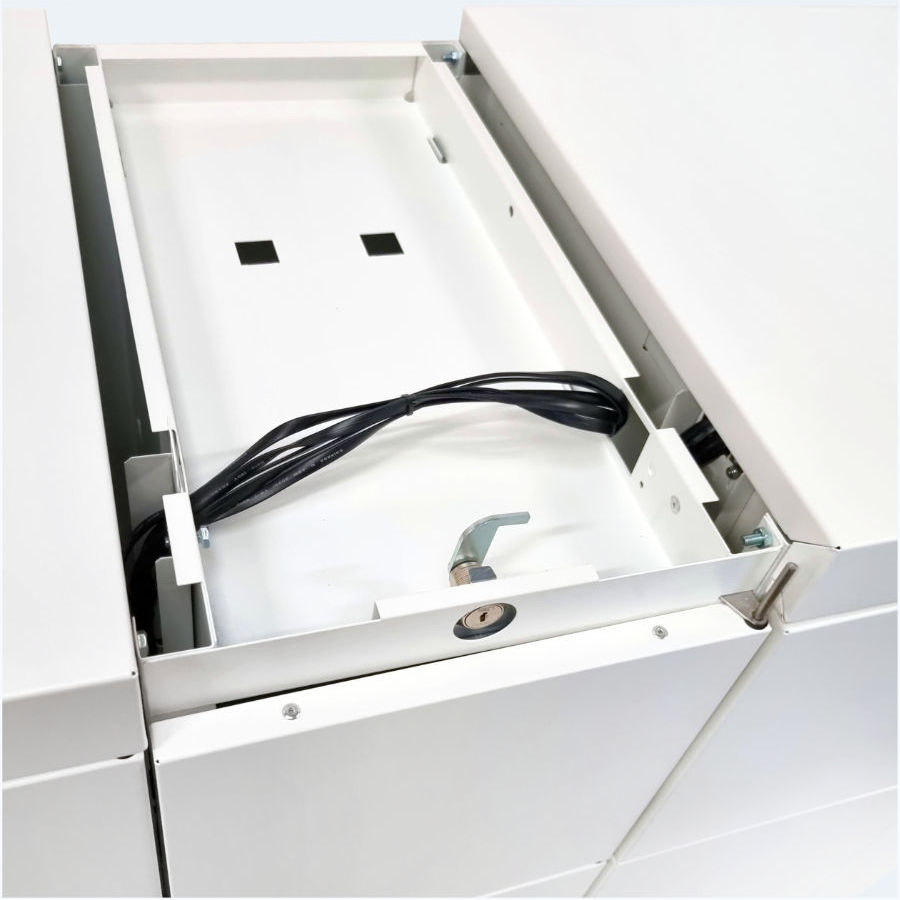 Electronics control unit and cabling in the upper part of a metal cabinet with lockable boxes