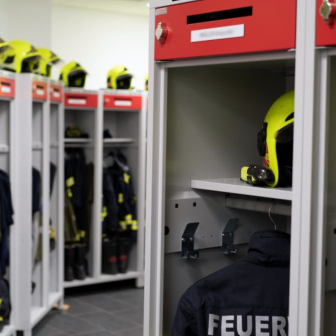 Personal belongings storage box built into the firefighting suit lockers