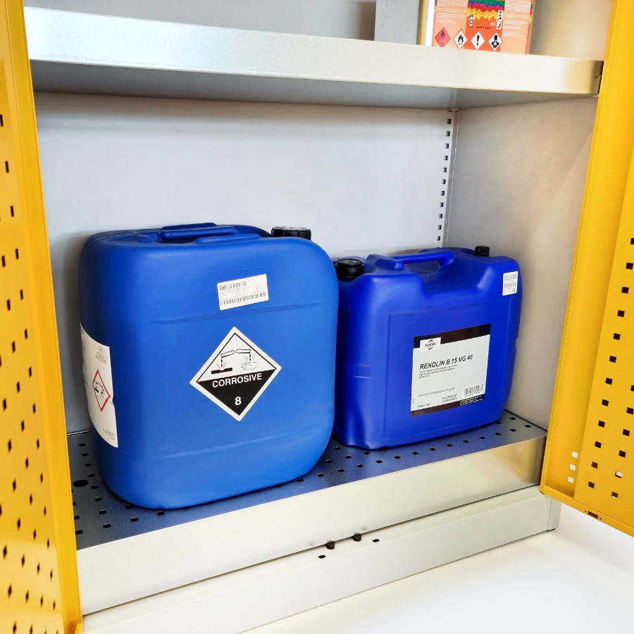 Lower containment tray of a large volume chemical storage cabinet.