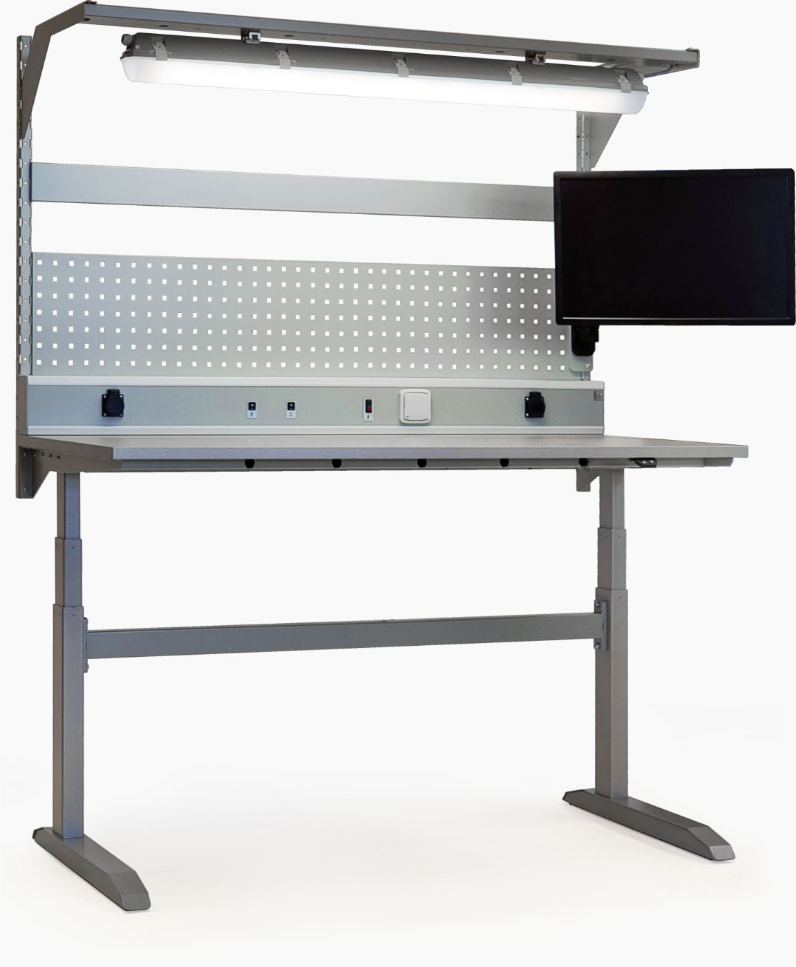 Height-adjustable work desk with an extension, lighting, and monitor holder. 